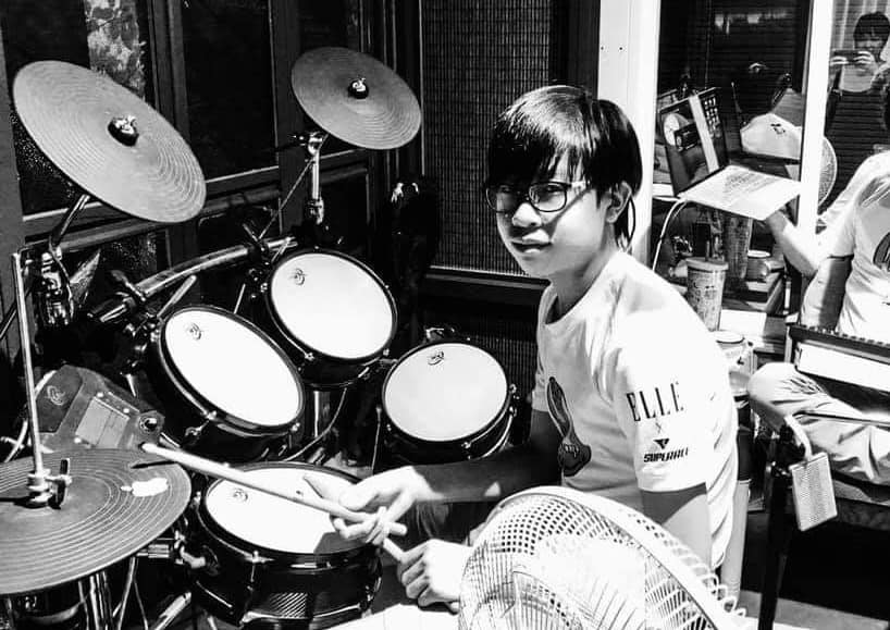 May be an image of 2 people, musical instrument and text