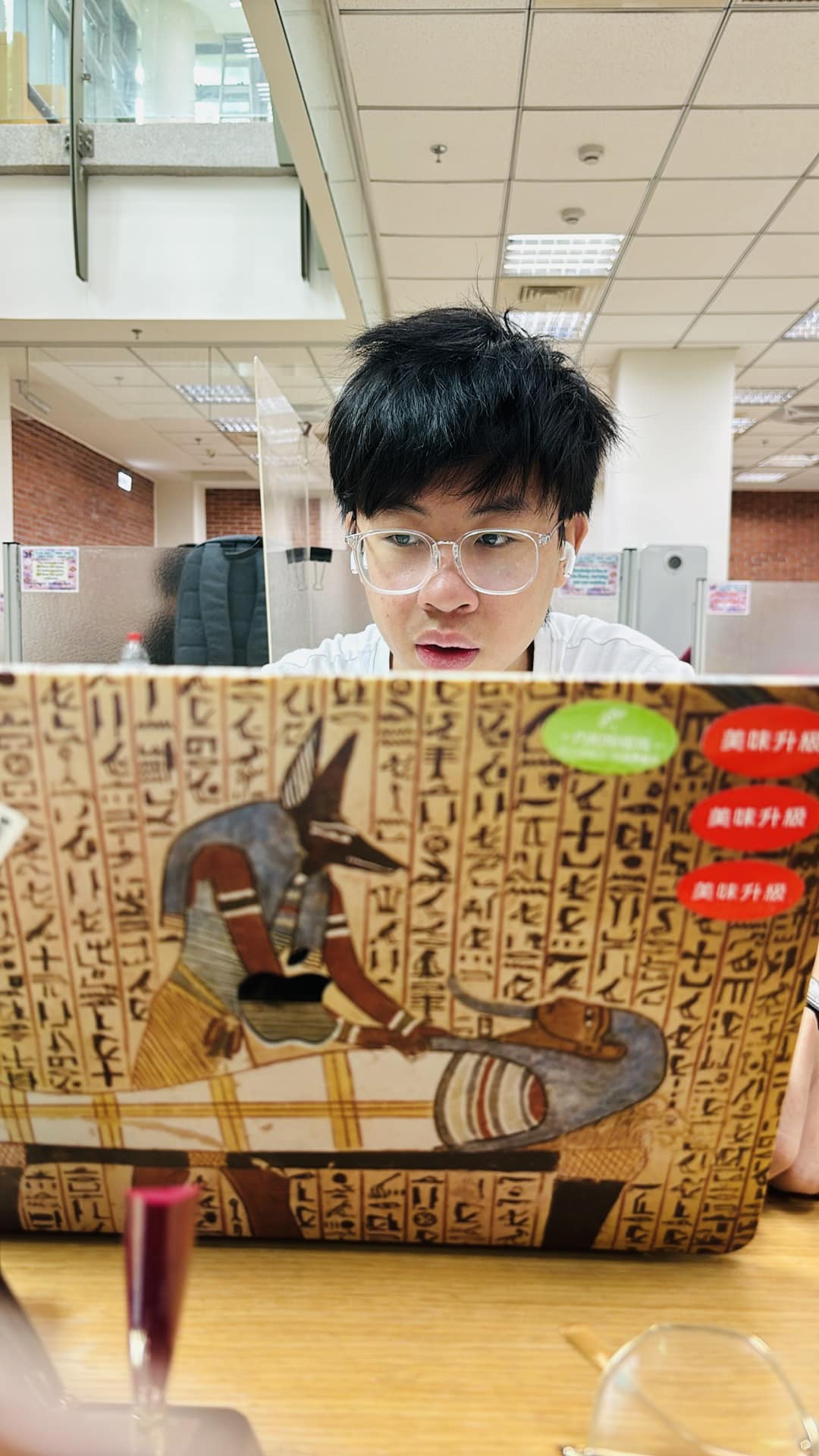 May be an image of 1 person, studying and text