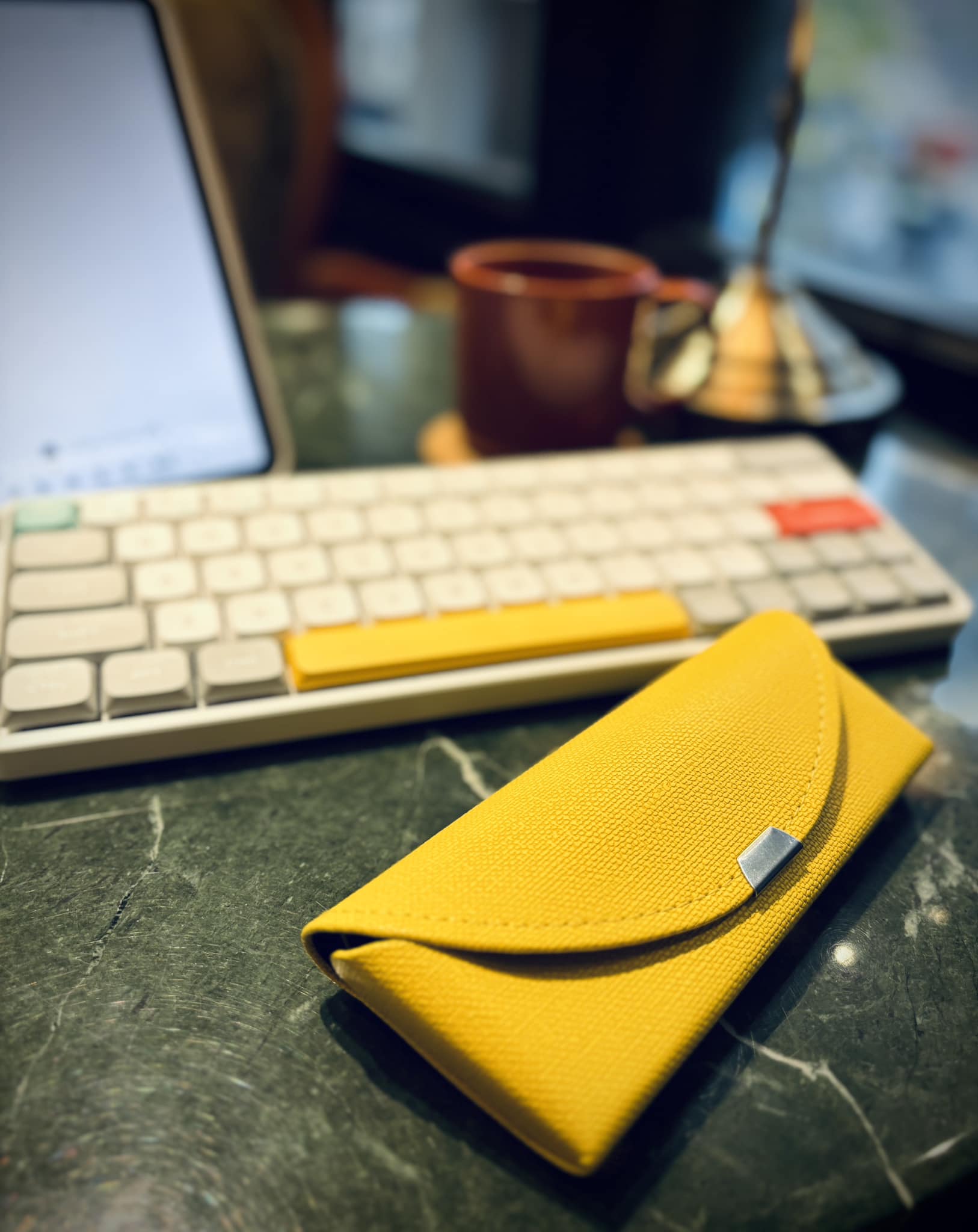 May be an image of saddle-stitched leather, leather wallet and leather